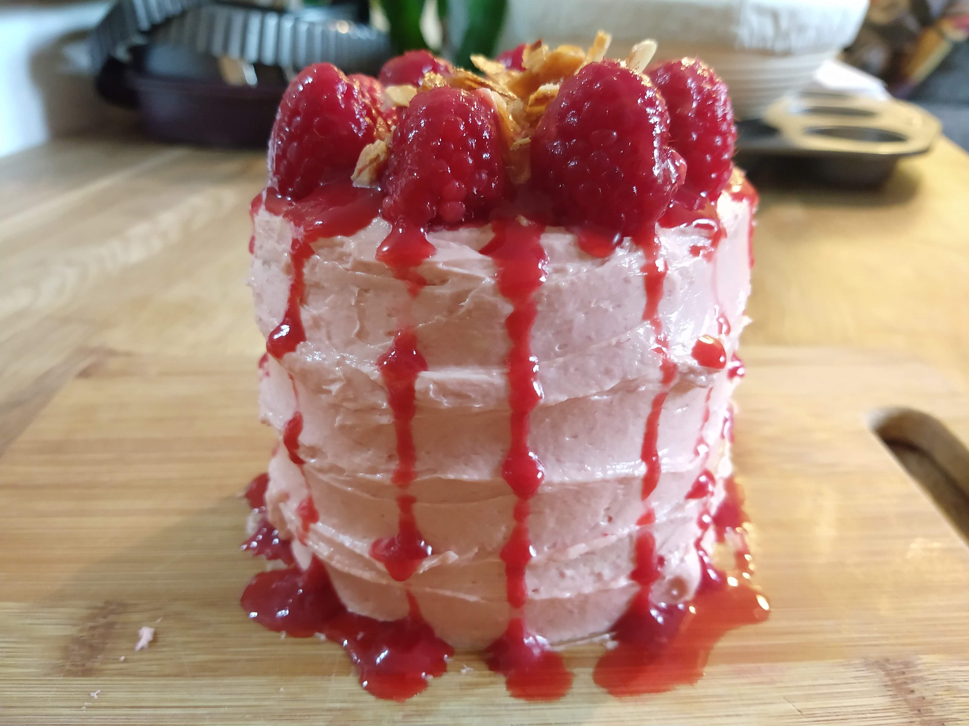 a raspberry and coconut cake, 4 inches in diameter